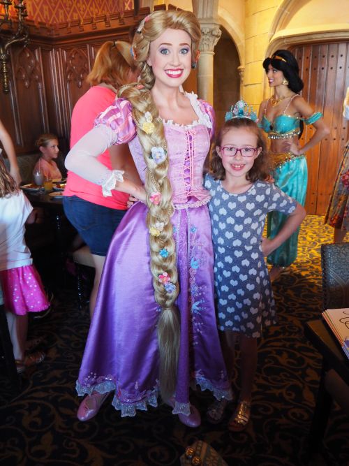 Meeting Rapunzel at Cinderella's Royal Table at Magic Kingdom at Disney World